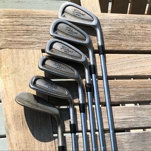 Titleist Dci 990 golf irons/Cleveland sand wedge